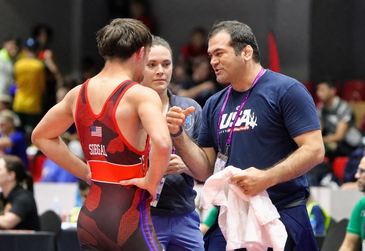 Mostafa Alizadeh giving mat-side guidance to an athlete